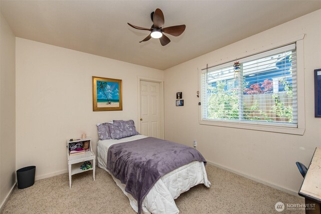 70 Onyx Ln, Sequim, WA 98382 - carpeted bedroom featuring baseboards and a ceiling fan