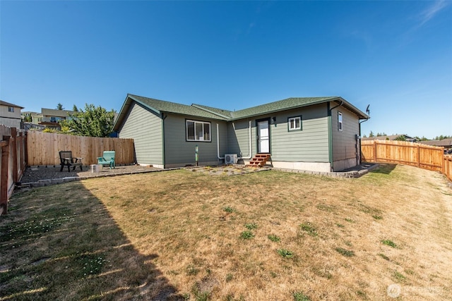 70 Onyx Ln, Sequim, WA 98382 - rear view of house featuring entry steps and a fenced backyard