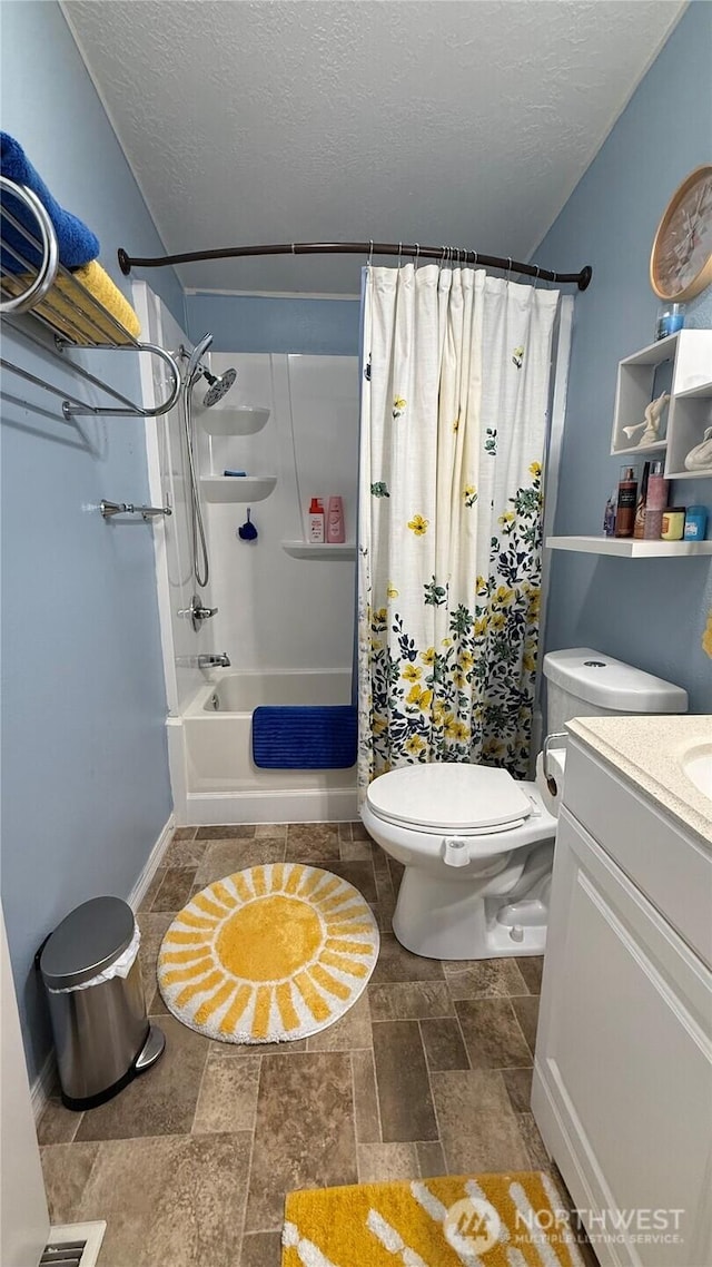 10426 11th Avenue Ct S, Tacoma, WA 98444 - full bath with vanity, a textured ceiling, stone finish flooring, and shower / bath combo with shower curtain