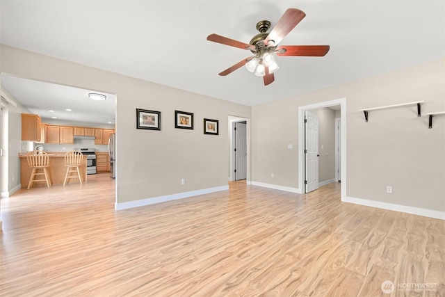 6209 Lincoln Dr, Ferndale, WA 98248 - unfurnished living room with a ceiling fan and light wood finished floors