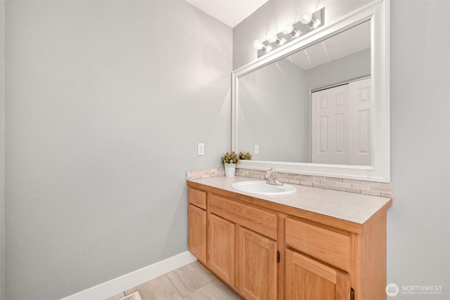 6209 Lincoln Dr, Ferndale, WA 98248 - bathroom featuring vanity, tile patterned floors, and backsplash