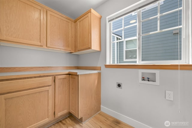 6209 Lincoln Dr, Ferndale, WA 98248 - laundry area featuring hookup for a washing machine, electric dryer hookup, light wood finished floors, and cabinet space