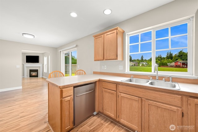 6209 Lincoln Dr, Ferndale, WA 98248 - kitchen with a peninsula, light countertops, dishwasher, light wood-type flooring, and recessed lighting