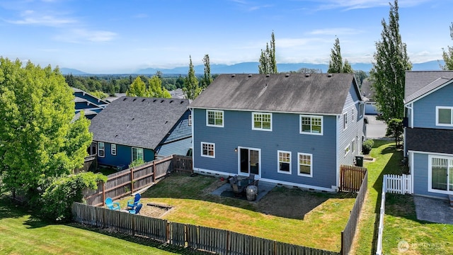 6209 Lincoln Dr, Ferndale, WA 98248 - back of property featuring a fenced backyard and roof with shingles
