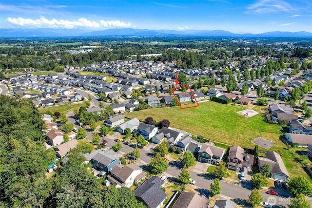 6209 Lincoln Dr, Ferndale, WA 98248 - aerial overview of property's location with a mountainous background and nearby suburban area