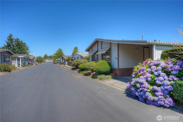 3611 I St NE Unit 10, Auburn, WA 98002 - view of asphalt road featuring a residential view