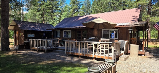 67 Northcott Rd, Winthrop, WA 98862 - back of house featuring a metal roof and a deck