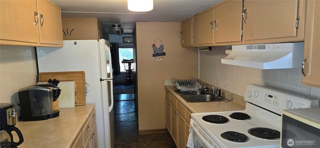 67 Northcott Rd, Winthrop, WA 98862 - kitchen featuring white appliances, light countertops, under cabinet range hood, and decorative backsplash