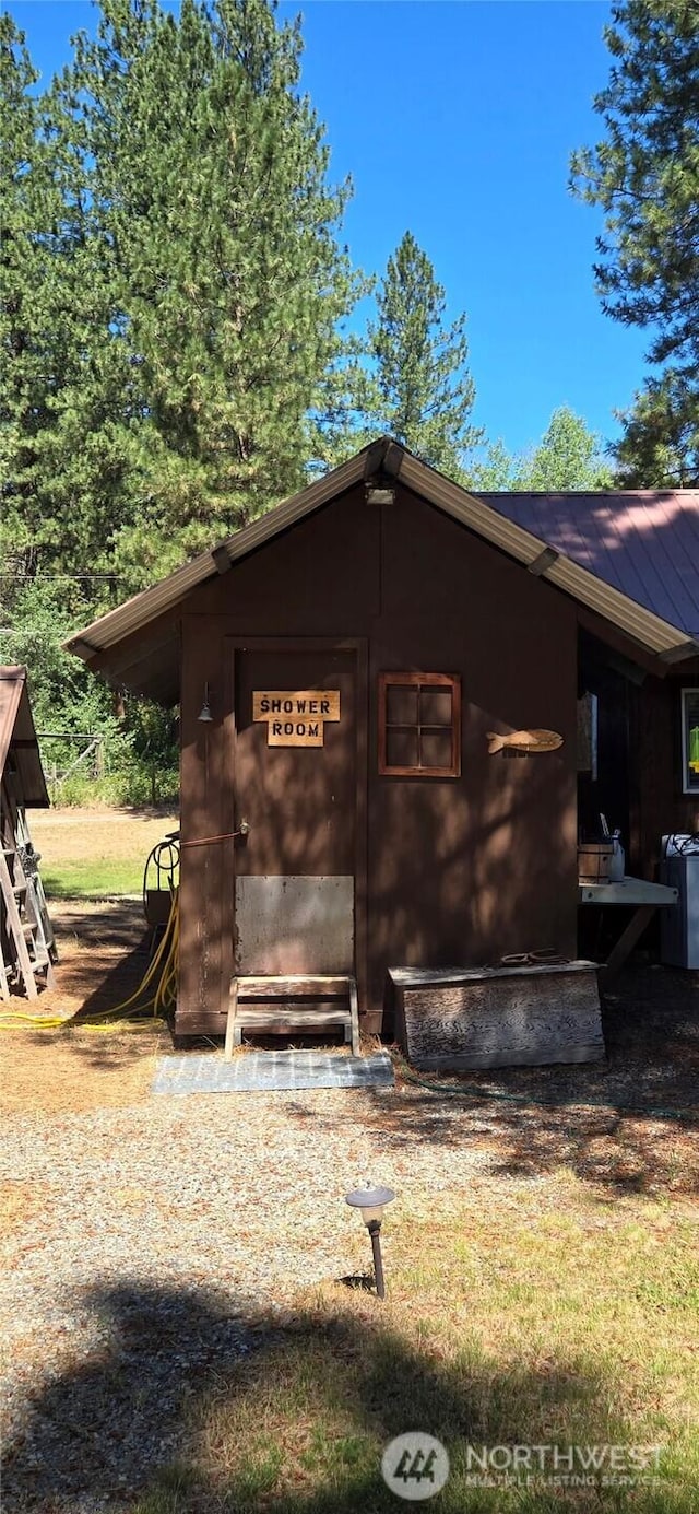 67 Northcott Rd, Winthrop, WA 98862 - view of property exterior featuring a metal roof