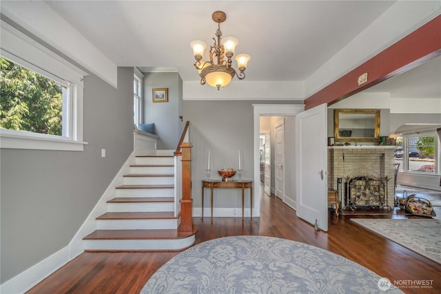 1721 N Steele St, Tacoma, WA 98406 - staircase with wood finished floors, healthy amount of natural light, and a chandelier