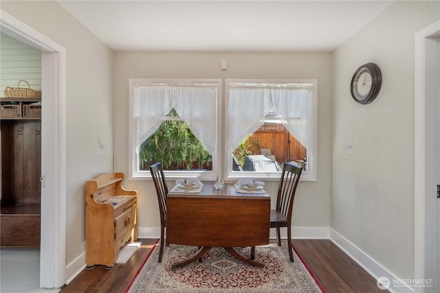 1721 N Steele St, Tacoma, WA 98406 - dining room with dark wood-style floors and baseboards