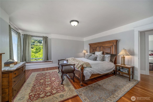 1721 N Steele St, Tacoma, WA 98406 - bedroom with wood finished floors and baseboards
