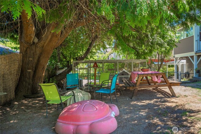 1721 N Steele St, Tacoma, WA 98406 - view of patio / terrace featuring a playground
