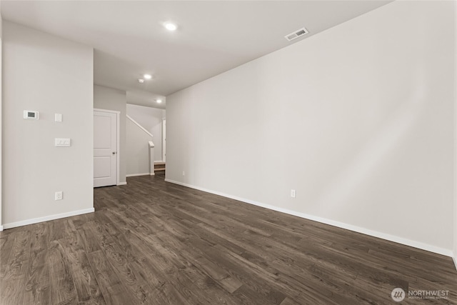 3913 23rd Ave NE Unit 97, Olympia, WA 98516 - spare room with dark wood-type flooring and recessed lighting