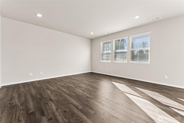 3913 23rd Ave NE Unit 97, Olympia, WA 98516 - unfurnished room featuring dark wood-style flooring and recessed lighting