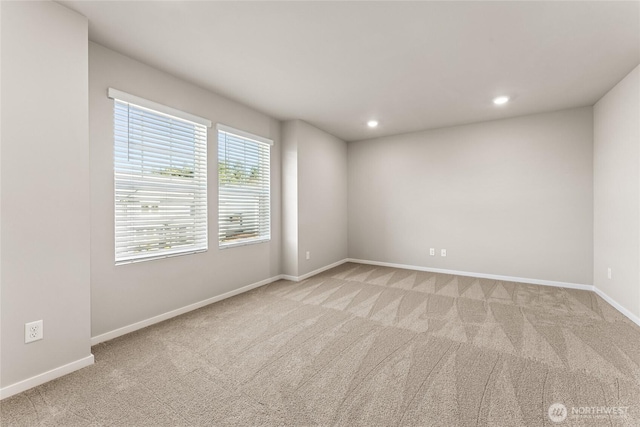 3913 23rd Ave NE Unit 97, Olympia, WA 98516 - spare room featuring light colored carpet and recessed lighting