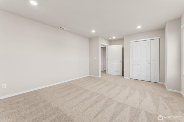 3913 23rd Ave NE Unit 97, Olympia, WA 98516 - unfurnished bedroom featuring recessed lighting, light colored carpet, and a closet
