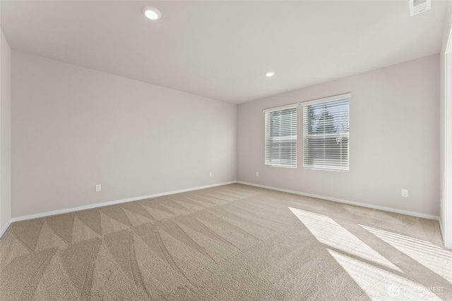 3913 23rd Ave NE Unit 97, Olympia, WA 98516 - empty room with light colored carpet and recessed lighting