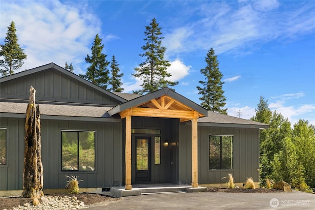 1450 Nelson Siding, Cle Elum, WA 98922 - view of front of home with a shingled roof, board and batten siding, and a porch