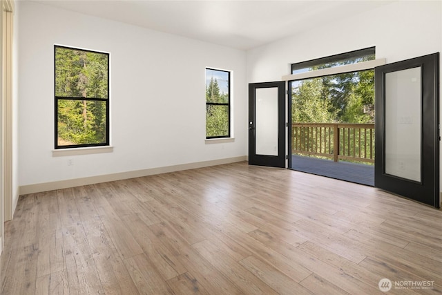1450 Nelson Siding, Cle Elum, WA 98922 - unfurnished room featuring light wood-style flooring and plenty of natural light