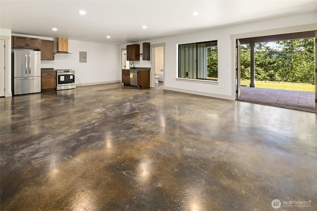 1450 Nelson Siding, Cle Elum, WA 98922 - unfurnished living room featuring concrete flooring, recessed lighting, and electric panel