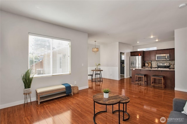 2025 Palisade Blvd, Dupont, WA 98327 - living area with wood finished floors and baseboards