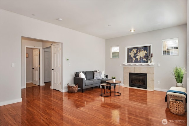 2025 Palisade Blvd, Dupont, WA 98327 - living room featuring wood finished floors and a tile fireplace