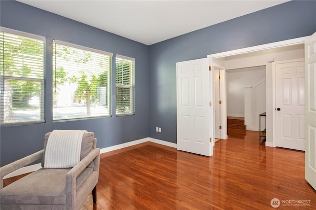 2025 Palisade Blvd, Dupont, WA 98327 - living area with wood finished floors and baseboards