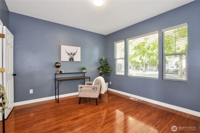 2025 Palisade Blvd, Dupont, WA 98327 - living area featuring wood finished floors and baseboards