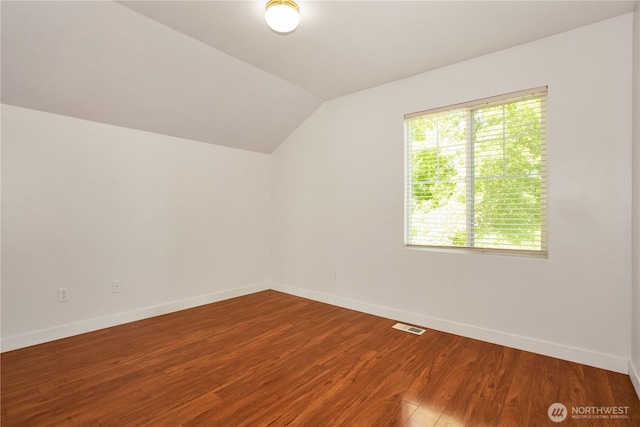 2025 Palisade Blvd, Dupont, WA 98327 - additional living space with vaulted ceiling and wood finished floors