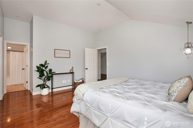 2025 Palisade Blvd, Dupont, WA 98327 - bedroom with wood finished floors and lofted ceiling