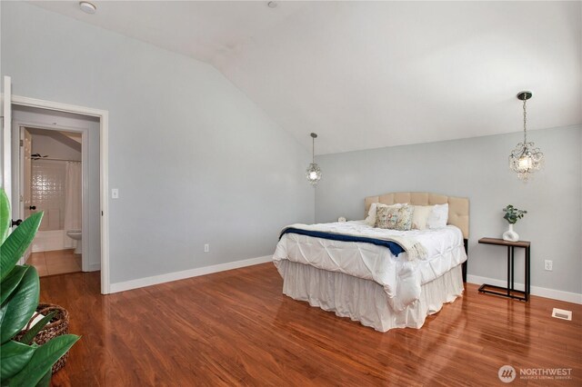 2025 Palisade Blvd, Dupont, WA 98327 - bedroom featuring lofted ceiling and wood finished floors