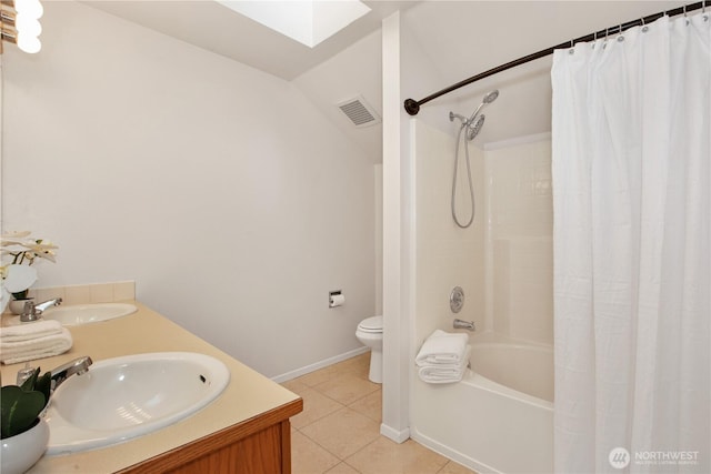 2025 Palisade Blvd, Dupont, WA 98327 - full bath featuring tile patterned flooring, a skylight, shower / tub combo, double vanity, and lofted ceiling