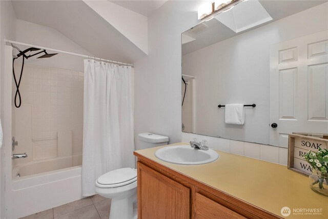 2025 Palisade Blvd, Dupont, WA 98327 - bathroom featuring a skylight, tile patterned flooring, vanity, and shower / bath combo