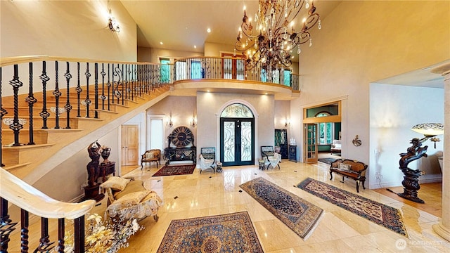 2837 E Lake Sammamish Pkwy NE, Sammamish, WA 98074 - foyer entrance with a towering ceiling, stairs, a chandelier, recessed lighting, and french doors