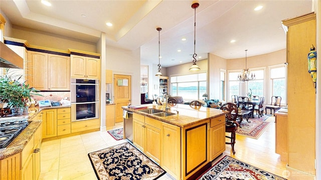2837 E Lake Sammamish Pkwy NE, Sammamish, WA 98074 - kitchen featuring appliances with stainless steel finishes, light brown cabinets, light stone counters, plenty of natural light, and recessed lighting
