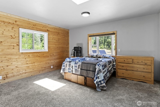 19002 Sorenson Rd SE, Yelm, WA 98597 - bedroom with carpet floors and wooden walls