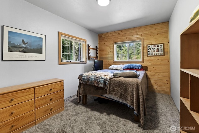 19002 Sorenson Rd SE, Yelm, WA 98597 - bedroom with wooden walls, carpet floors, and multiple windows