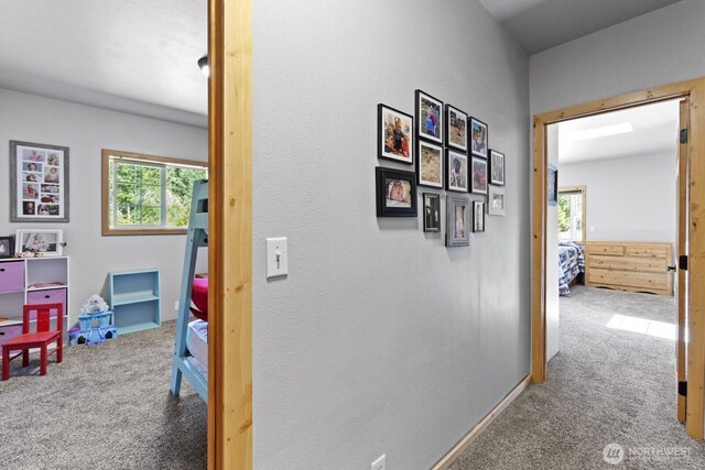 19002 Sorenson Rd SE, Yelm, WA 98597 - hallway with carpet and healthy amount of natural light