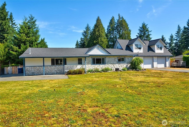 3711 116th St SE, Everett, WA 98208 - view of front of property featuring stone siding, a porch, a front yard, and driveway