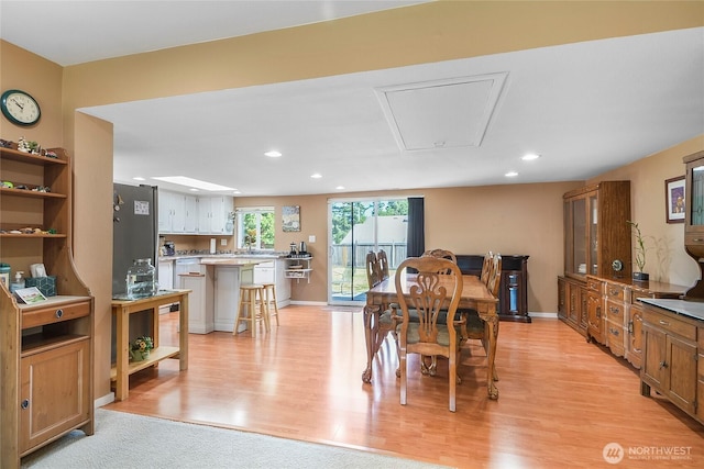 3711 116th St SE, Everett, WA 98208 - dining area featuring attic access, light wood finished floors, and recessed lighting