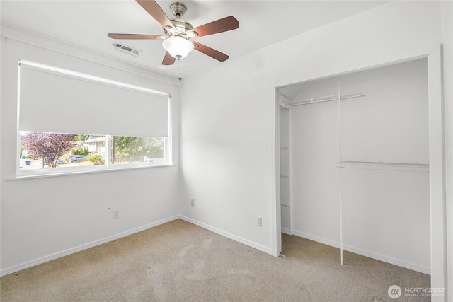 3711 116th St SE, Everett, WA 98208 - unfurnished bedroom featuring a closet, carpet flooring, and a ceiling fan