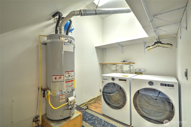3711 116th St SE, Everett, WA 98208 - laundry area featuring water heater, washing machine and dryer, and wood finished floors