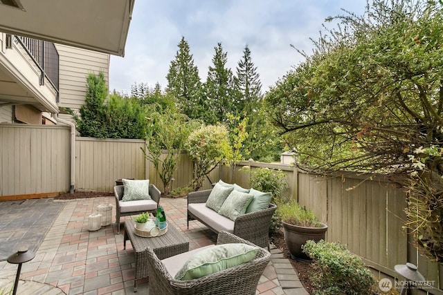 10036 NE 115th Ln Unit A3, Kirkland, WA 98033 - fenced backyard featuring a patio and an outdoor living space