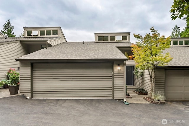 10036 NE 115th Ln Unit A3, Kirkland, WA 98033 - view of front facade featuring a shingled roof