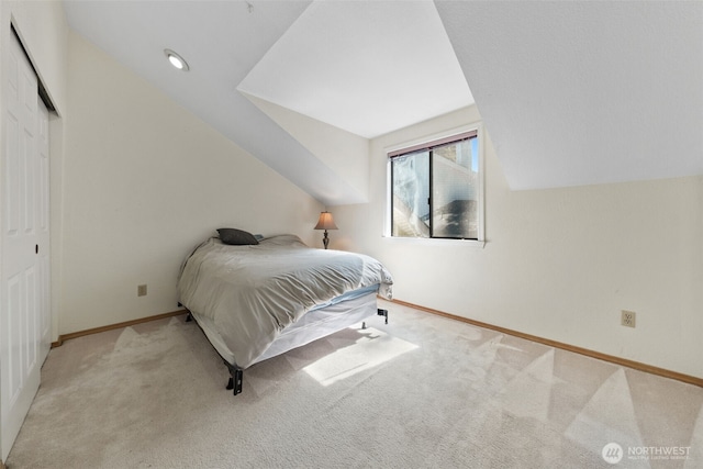 4051 S 159th Ln, Tukwila, WA 98188 - carpeted bedroom with vaulted ceiling and a closet
