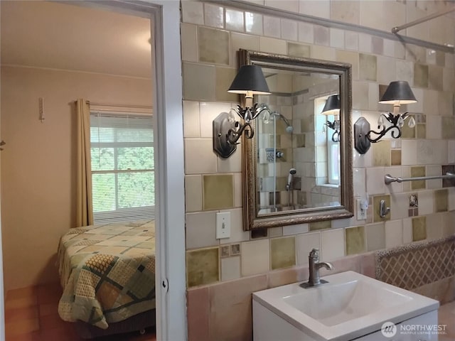306 Henderson Way E, Tonasket, WA 98855 - bathroom featuring vanity and decorative backsplash