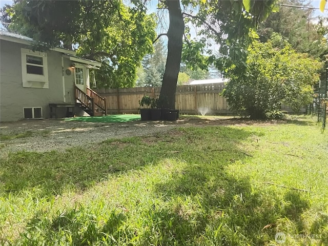 306 Henderson Way E, Tonasket, WA 98855 - fenced backyard featuring entry steps