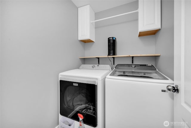 6815 278th St NW, Stanwood, WA 98292 - laundry area with cabinet space and washer and dryer