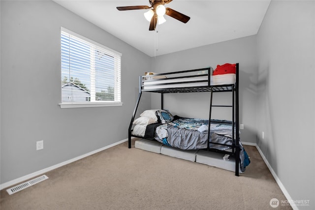 6815 278th St NW, Stanwood, WA 98292 - carpeted bedroom featuring baseboards and a ceiling fan